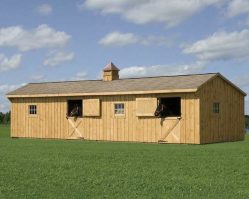 Shed-row style wooden horse barn with three stalls and Dutch doors, designed for equine shelter and easy access—available from Salem Structures.